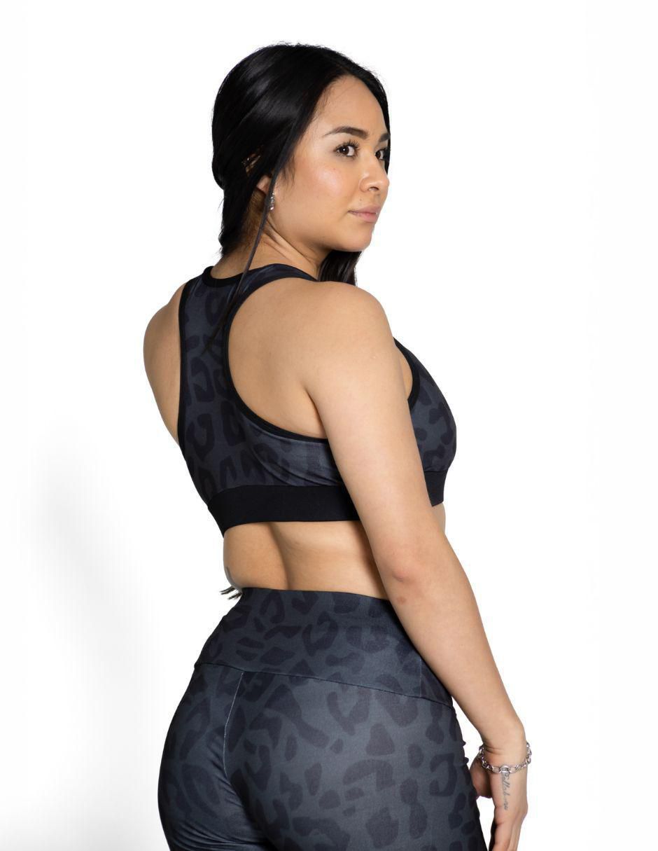Top deportivo Rhinomax para entrenamiento mujer