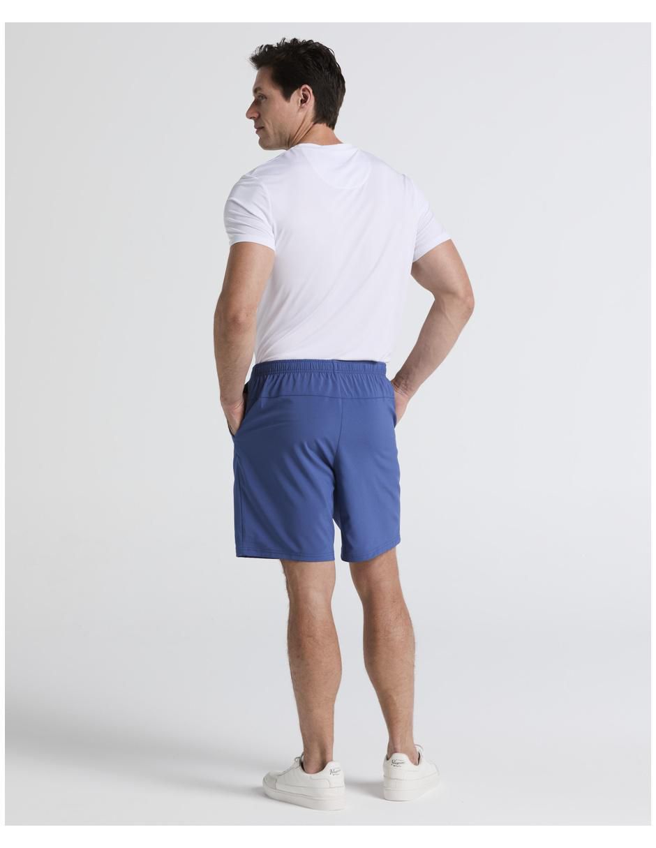 Short con bolsillos para deporte con raqueta hombre