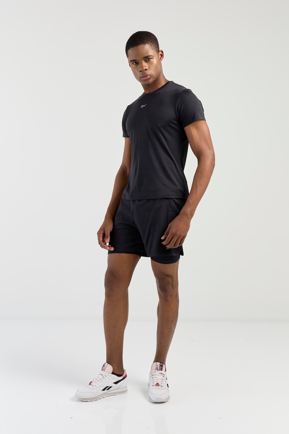 Short efecto doble prenda para correr hombre