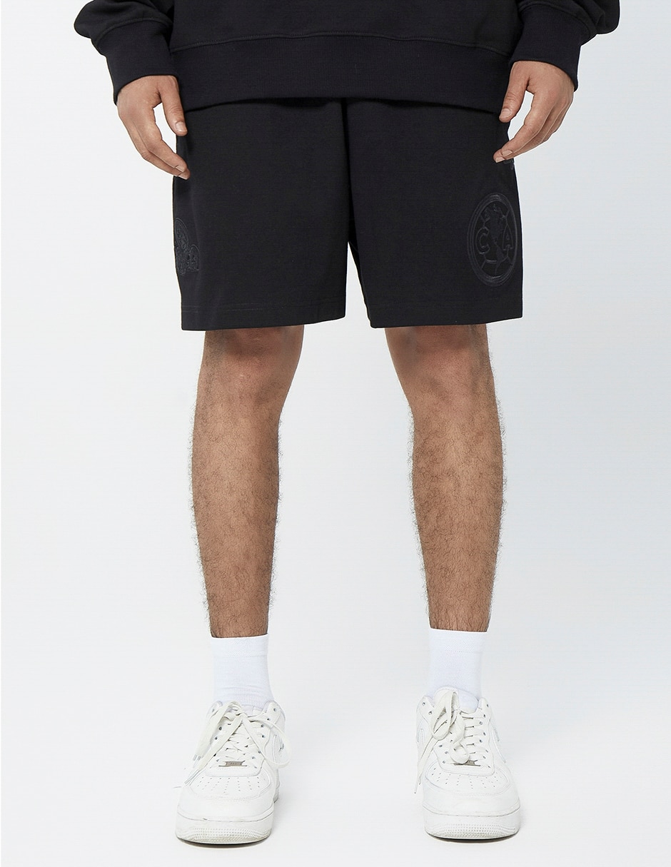 Short con bolsillos para fútbol hombre
