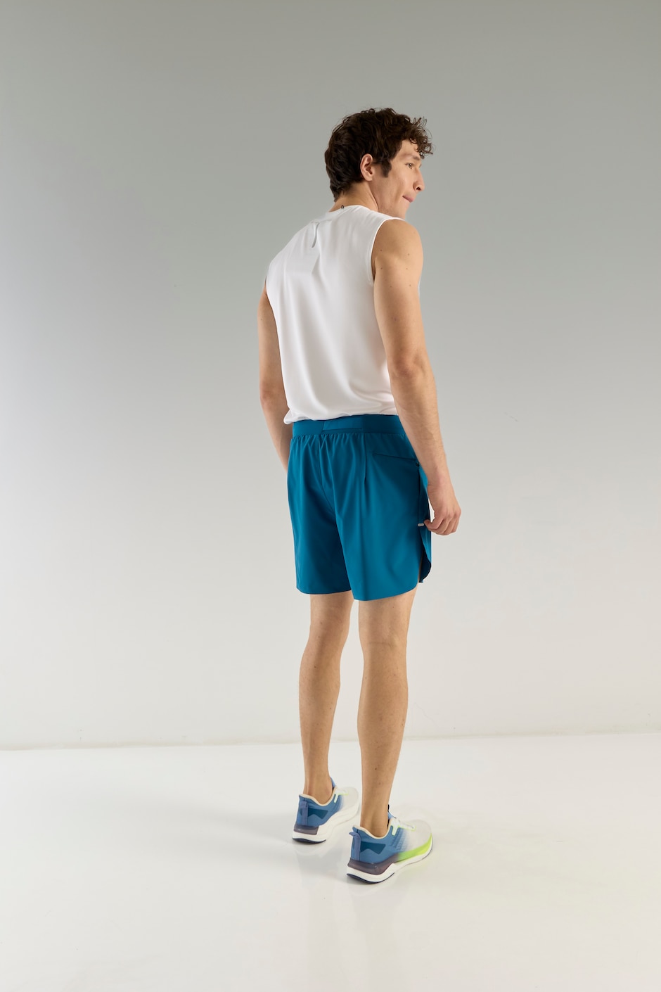 Short con malla con bolsillos  para correr hombre 11