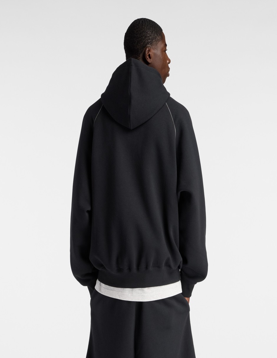 Sudadera New Balance con capucha y bolsa para hombre