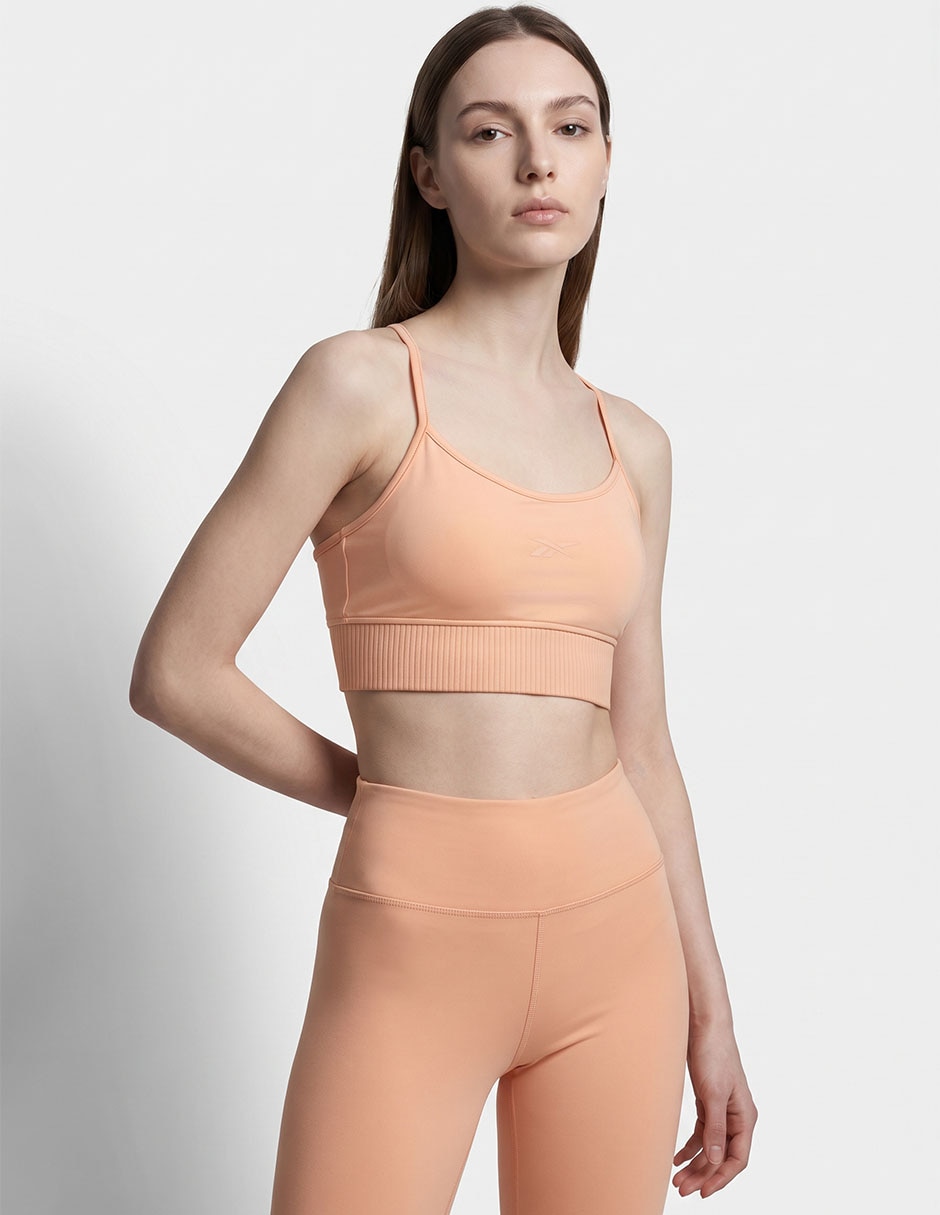 Top deportivo reebok para yoga mujer