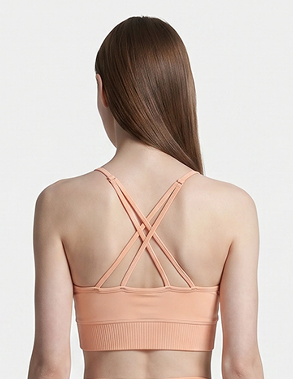 Top deportivo reebok para yoga mujer