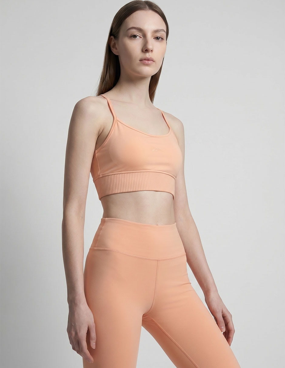 Top deportivo reebok para yoga mujer